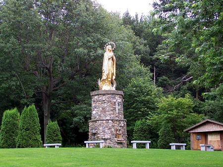 St Anne statue.  Saint Anne's Shrine is located on Isle LaMotte, a quiet island on Lake Champlain in Vermont. It was developed by the Society of Saint Edmund and has been maintained by them for 100 years..